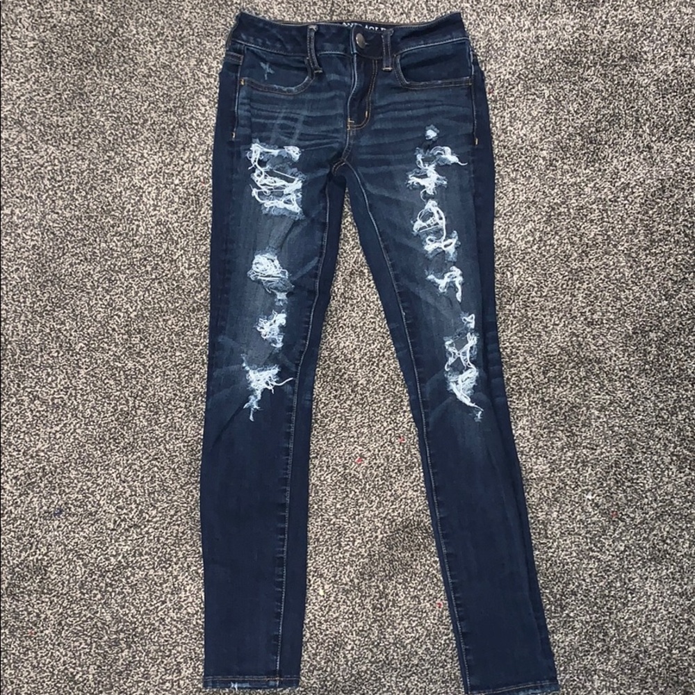Dark blue wash ripped skinny jeans